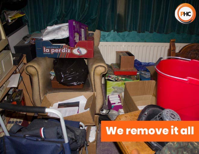 room full with clutter unwanted rubbish waste and furniture